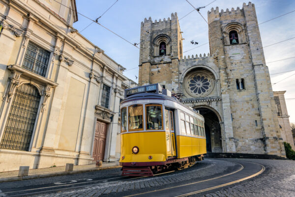 Cathedral of Lisbon with yellow tram