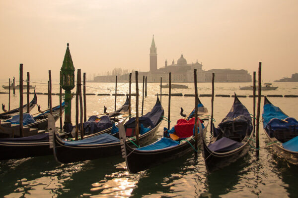 Gondolas on a canal in Venice